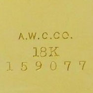 Watch Case Marking for American Watch Case Co. 18K: A.W.C.Co. 
18K