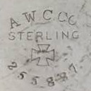 Watch Case Marking for American Watch Case Co. of Toronto, Ltd. AWCCo Sterling: A.W.C.Co. Sterling Winged Wheel