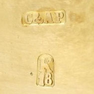 Watch Case Marking for C. & A. Pequignot 18K: C&AP K18 in Gumdrop Embossed