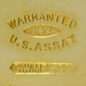 Watch Case Marking Variant for  14K: Warranted
14K
U.S. Assay
C.W.Mfg.Co.
[Eye]