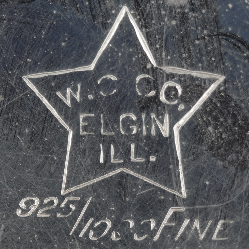Watch Case Marking Variant for Star Watch Case Co. Star Sterling Silver: [star]
W.C.Co.
Elgin
Ill.
[inside Star]
925/1000 Fine
