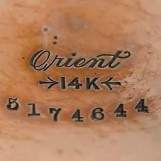 Watch Case Marking Variant for Fahys Watch Case Co. Orient: Orient
[Arrow] 14 K [Arrow]