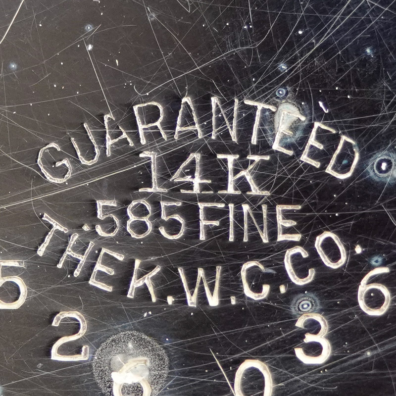 Watch Case Marking Variant for  14K: Guaranteed
14K
.585 Fine
The K.W.C.Co.