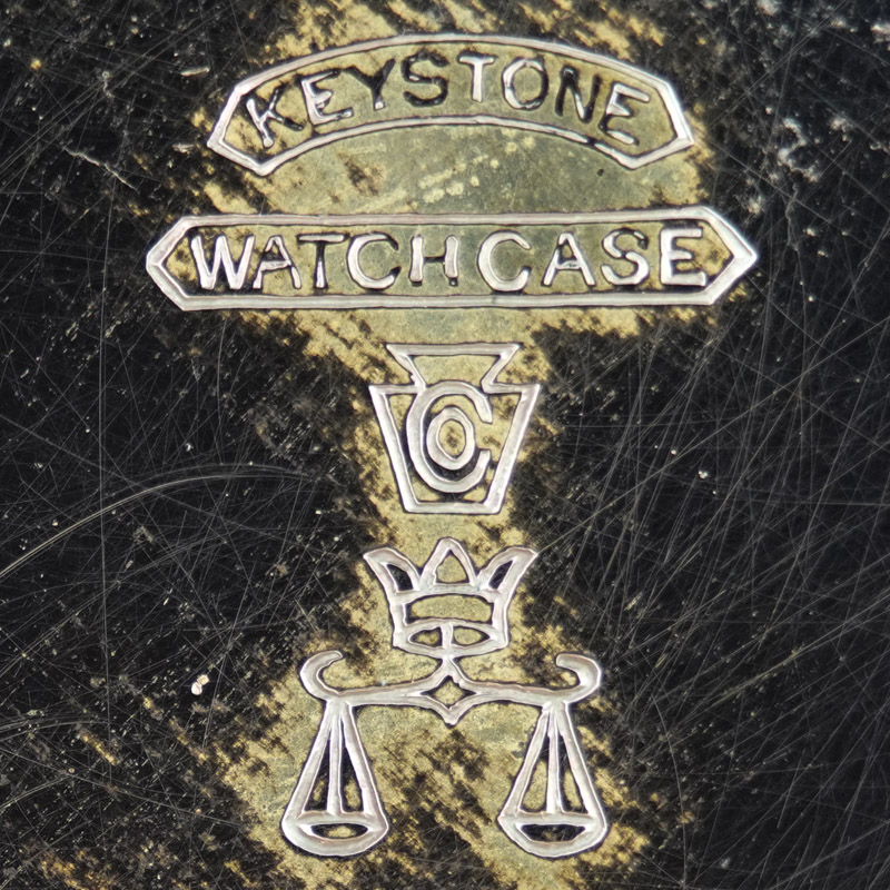 Watch Case Marking Variant for Keystone Watch Case Co. Boss Scale Crown 14K/20YR: Keystone
Watch Case Co.
[Keystone Block]
[Crown and Scales]