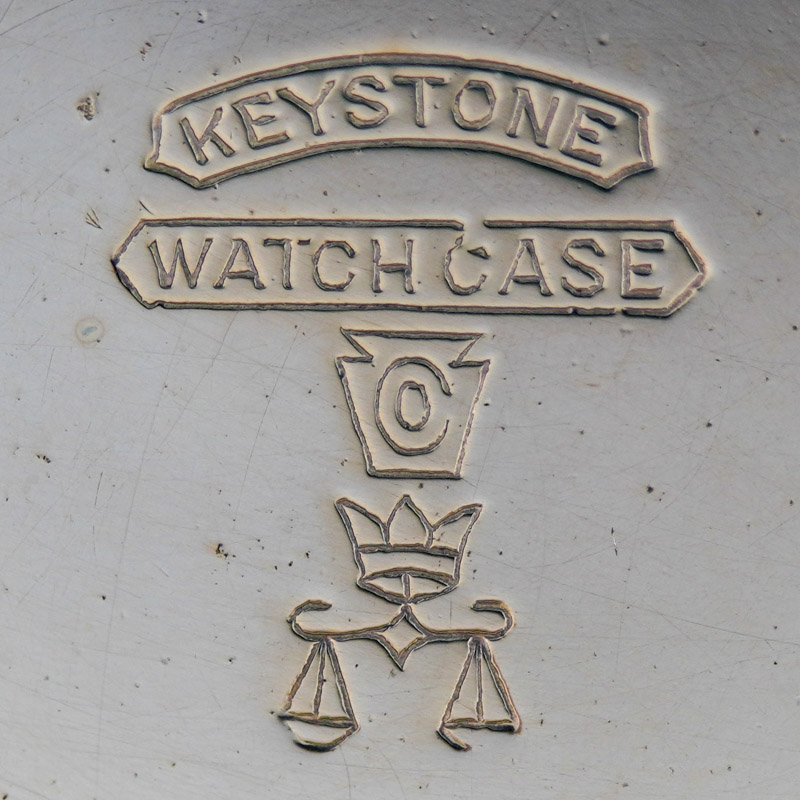 Watch Case Marking Variant for Keystone Watch Case Co. Boss Scale Crown 14K/25YR: Keystone
Watch Case Co.
[Keystone Block]
[Crown and Scales]