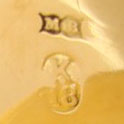 Watch Case Marking for Margot Bros. 18K: MB in Book Ribbon K18 in Oval Embossed E.F.M. Pat'd Feb. 21. 92