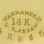 Watch Case Marking for New York Gold Watch Case Co. 14K: N.Y.G.W.C.Co. in Pointed Ribbon Embossed Warranted 14K U.S. Assay