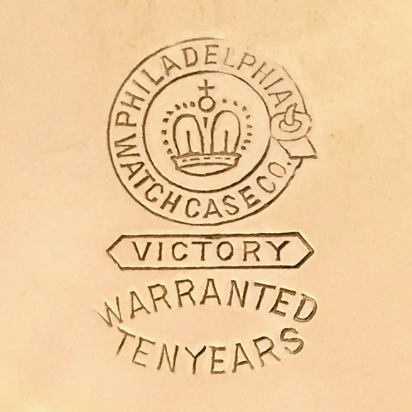 Watch Case Marking Variant for Philadelphia Watch Case Co. Victory: Philadelphia
Watch Case Co.
Victory
[Crown with Cross]
[Buckle]
[in Circle]
Warranted
Ten Years