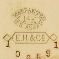 Watch Case Marking for Roy Watch Case Co. 14K E. Howard Label: E.H.&Co. in Outlined Ribbon with Diamonds Warranted 14K U.S. Assay