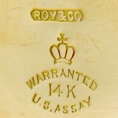 Watch Case Marking Variant for Roy & Co. 14K: Roy&Co [in Pointed Ribbon]
[Crown with Cross]
Warranted
14K
U.S.Assay