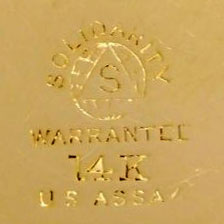 Watch Case Marking Variant for Solidarity Watch Case Co. 14K: Solidarity
S
[Triangle in Globe/Earth]
Warranted
14K
U.S. Assay