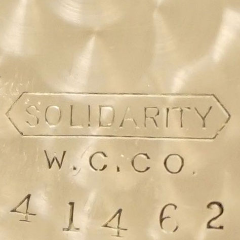 Watch Case Marking for Solidarity Watch Case Co. 10K: Solidarity in Pointed Ribbon W.C.Co.