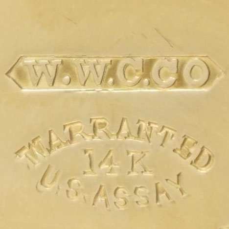 Watch Case Marking for Willemin Watch Case Co. 14K: W.W.C.Co., WWCCo in Pointed Ribbon Embossed Warranted 14 K U.S. Assay