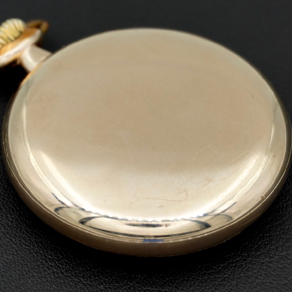 How do you open the online back of a pocket watch