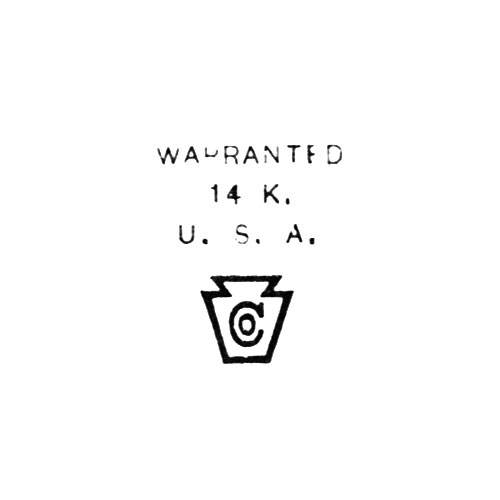 Warranted
14 K.
U.S.A.
[Keystone Logo] (Keystone Watch Case Co.)